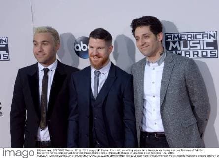 From left, recording artists Pete Wentz, Andy Hurley and Joe Trohman of Fall Out Boy arrive for the 43rd annual American Music Awards held at Microsoft Theater in Los Angeles on November 22, 2015.  LAP20151122306 JIMxRUYMEN