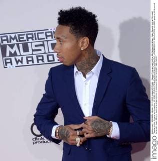 Rapper Tyga arrives for the 43rd annual American Music Awards held at Microsoft Theater in Los Angeles on November 22, 2015.  LAP20151122325 JIMxRUYMEN