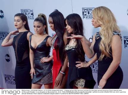 Singing group Fifth Harmony arrives for the 43rd annual American Music Awards held at Microsoft Theater in Los Angeles on November 22, 2015.  LAP2015112264 JIMxRUYMEN