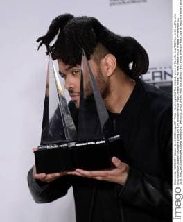 Recording artist The Weeknd, winner of Favorite Soul R&B Male Artist and Favorite Soul R&B Album, appears backstage during the 43rd annual American Music Awards held at Microsoft Theater in Los Angeles on November 22, 2015.  LAP20151122428 JIMxRUYMEN