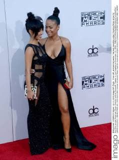 From left, actress Karrueche Tran and recording artist Christina Milian arrive for the 43rd annual American Music Awards held at Microsoft Theater in Los Angeles on November 22, 2015.  LAP20151122521 JIMxRUYMEN