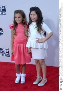 From left, TV personalities Rosie Grace and Sophia Grace arrive for the 43rd annual American Music Awards held at Microsoft Theater in Los Angeles on November 22, 2015.  LAP20151122563 JIMxRUYMEN
