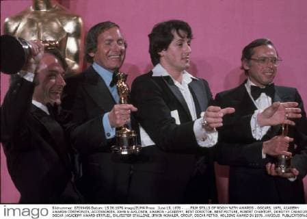 June 15, 1976 - .....FILM STILLS OF ROCKY WITH AWARDS - OSCARS, 1976, ACADEMY AWARDS CEREMONIES, ACCESSORIES, JOHN G AVILDSEN, AWARDS - ACADEMY, BEST DIRECTOR, BEST PICTURE, ROBERT CHARTOFF, DOROTHY CHANDLER PAVILION, OSCAR (ACADEMY AWARD STATUE), SYLVESTER STALLONE, IRWIN WINKLER, GROUP, OSCAR RETRO, HOLDING AWARD IN 1976..VARIOUS. - ZUMAs90_