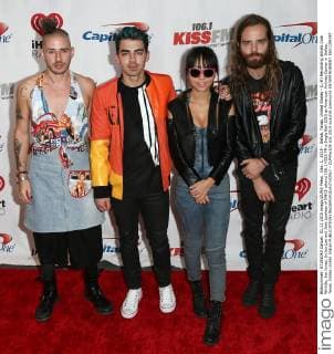 Dec. 1, 2015 - Dallas, Texas, United States - (L-R) Recording artists Cole Whittle, Joe Jonas, JinJoo Lee and Jack Lawless of DNCE attend 106.1 KISS FM s Jingle Ball 2015 at American Airlines Center in Dallas, Texas. Dallas United States - ZUMAw109