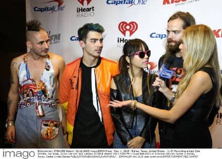 Dec. 1, 2015 - Dallas, Texas, United States - (L-R) Recording artists Cole Whittle, Joe Jonas, JinJoo Lee and Jack Lawless of DNCE attend 106.1 KISS FM s Jingle Ball 2015 at American Airlines Center in Dallas, Texas. Dallas United States - ZUMAw109