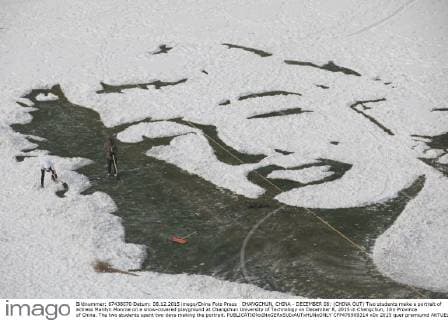 CHANGCHUN, CHINA - DECEMBER 08: (CHINA OUT) Two students make a portrait of actress Marilyn Monroe on a snow-covered playground at Changchun University of Technology on December 8, 2015 in Changchun, Jilin Province of China. The two students spent two days making the portrait.  CFP476909314