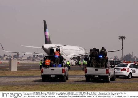 (151208) -- MEXICO CITY, Dec. 8, 2015 -- Elements of the Secretariat of the Navy arrive to the security zone of the Terminal 1 of the Mexico City s International Airport , in Mexico City, capital of Mexico, on Dec. 8, 2015. According to local press, a plane with 179 passengers aboard was evacuated on Tuesday at the Mexico City airport due to a bomb threat. It was determined that there is no explosive device after executing the established security protocols. ) (rtg) (ah) MEXICO-MEXICO CITY-SECURITY-AIRPLANE JorgexRios 