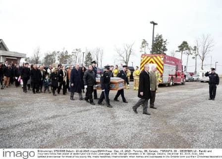 Dec. 10, 2015 - Toronto, ON, Canada - TORONTO, ON - DECEMBER 10 - Family and mourners follow the casket of seven-year-old Evan Leversage, at St. George Cemetery in St. George, Ontario, December 10, 2015. Evan, who battled brain cancer for most of his young life, made headlines internationally when homes and businesses in the Ontario town put their Christmas decorations up in October, after doctors told his family he was unlikely to live to Christmas and they should celebrate early. Toronto Canada - ZUMAt14_