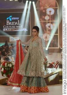 Dec. 11, 2015 - Lahore, Punjab, Pakistan - Pakistani models present creations by famous designer HSY, Shazia Kiyani, Aisha Imran, Zarmisha Dar on the first day of the Telenor Fashion Bridal Couture Week in Lahore. Lahore Pakistan - ZUMAp133