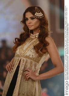 Dec. 11, 2015 - Lahore, Punjab, Pakistan - Pakistani models present creations by famous designer HSY, Shazia Kiyani, Aisha Imran, Zarmisha Dar on the first day of the Telenor Fashion Bridal Couture Week in Lahore. Lahore Pakistan - ZUMAp133