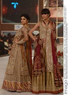 Dec. 11, 2015 - Lahore, Punjab, Pakistan - Pakistani models present creations by famous designer HSY, Shazia Kiyani, Aisha Imran, Zarmisha Dar on the first day of the Telenor Fashion Bridal Couture Week in Lahore. Lahore Pakistan - ZUMAp133