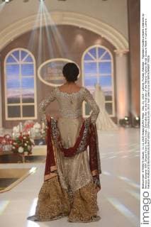 Dec. 11, 2015 - Lahore, Punjab, Pakistan - Pakistani models present creations by famous designer HSY, Shazia Kiyani, Aisha Imran, Zarmisha Dar on the first day of the Telenor Fashion Bridal Couture Week in Lahore. Lahore Pakistan - ZUMAp133