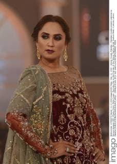 Dec. 11, 2015 - Lahore, Punjab, Pakistan - Pakistani models present creations by famous designer HSY, Shazia Kiyani, Aisha Imran, Zarmisha Dar on the first day of the Telenor Fashion Bridal Couture Week in Lahore. Lahore Pakistan - ZUMAp133
