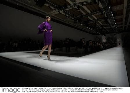 (151212) -- BEIJING, Dec. 12, 2015 -- A model presents a creation designed by Grace Chen at a fashion show in Beijing, capital of China, Dec. 12, 2015. ) (yxb) CHINA-BEIJING-GRACE CHEN-FASHION SHOW (CN) ShenxBohan 