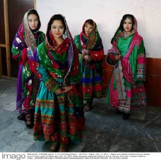 (151212) -- KABUL, Dec. 11, 2015 -- Afghan girls present creations during a fashion show in Kabul, capital of Afghanistan, Dec. 11, 2015. Afghan designers displayed traditional clothes during a show held in western Kabul on Friday. ) AFGHANISTAN-KABUL-FASHION SHOW RahmatxAlizadah 