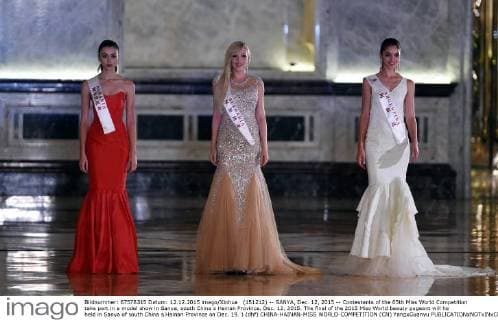 (151212) -- SANYA, Dec. 12, 2015 -- Contestants of the 65th Miss World Competition take part in a model show in Sanya, south China s Hainan Province, Dec. 12, 2015. The final of the 2015 Miss World beauty pageant will he held in Sanya of south China s Hainan Province on Dec. 19. ) (dhf) CHINA-HAINAN-MISS WORLD-COMPETITION (CN) YangxGuanyu 