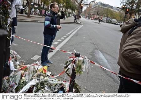 Dec. 13, 2015 - Paris, France - People pay their respect to the victims of Paris terrorist attacks in front of Bataclan concert hall in Paris, France on December 13, 2015 Paris France  - ZUMAn230
