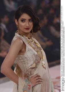 Dec. 13, 2015 - Lahore, Punjab, Pakistan - Pakistani model presents the creation of the famous designer Erum Khan the last day of Telenor Fashion Bridal Couture Week in Lahore. Lahore Pakistan - ZUMAp133