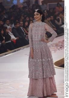 Dec. 13, 2015 - Lahore, Punjab, Pakistan - Pakistani model presents the creation of the famous designer Erum Khan the last day of Telenor Fashion Bridal Couture Week in Lahore. Lahore Pakistan - ZUMAp133