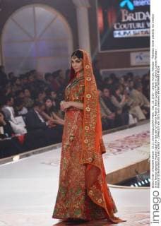 Dec. 13, 2015 - Lahore, Punjab, Pakistan - Pakistani model presents the creation of the famous designer Arsalan Iqbal the last day of Telenor Fashion Bridal Couture Week in Lahore. Lahore Pakistan - ZUMAp133
