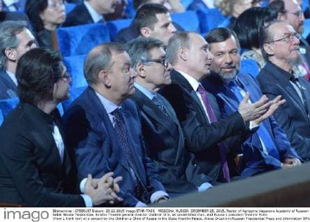 MOSCOW, RUSSIA. DECEMBER 25, 2015. Rector of Agrippina Vaganova Academy of Russian Ballet Nikolai Tsiskaridze, Bolshoi Theatre general director Vladimir Urin, an unidentified man, and Russia s president Vladimir Putin (from L front row) at a concert by the Children s Choir of Russia in the State Kremlin Palace. Alexei Druzhinin Russian Presidential Press and Information Office TASS  TS014A4F