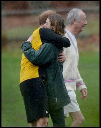 . 24 12 2015. Castle Rising, United Kingdom. Prince William and Prince Harry playing football on Christmas Eve in Castle Rising, Norfolk. Prince Harry Cuddles a girl after the match.  xAndrewxParsonsx xi-Imagesx IIM-11620-0070