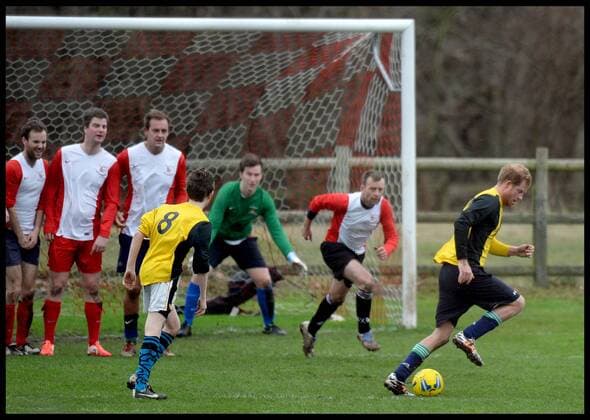 . 24 12 2015. Castle Rising, United Kingdom. Prince William and Prince Harry playing football on Christmas Eve in Castle Rising, Norfolk.  xAndrewxParsonsx xi-Imagesx IIM-11620-0043
