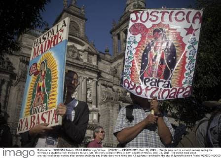 (151227) -- MEXICO CITY, Dec. 26, 2015 -- People take part in a march remembering the 43 missing students from the Isidro Burgos rural teachers college in Mexico City, capital of Mexico, Dec. 26, 2015. The march took place one year and three months after several students and bystanders were killed and 43 students vanished in the city of IgualaAlejandro Ayala) MEXICO-MEXICO CITY-MISSING STUDENTS-MARCH e AlejandroxAyala 