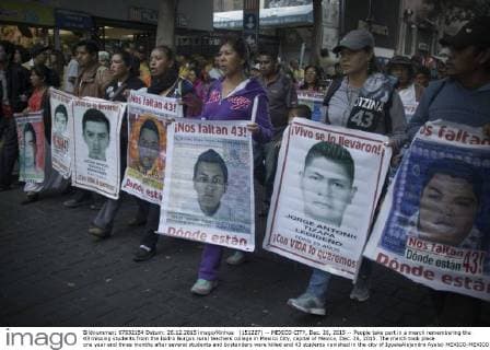 (151227) -- MEXICO CITY, Dec. 26, 2015 -- People take part in a march remembering the 43 missing students from the Isidro Burgos rural teachers college in Mexico City, capital of Mexico, Dec. 26, 2015. The march took place one year and three months after several students and bystanders were killed and 43 students vanished in the city of IgualaAlejandro Ayala) MEXICO-MEXICO CITY-MISSING STUDENTS-MARCH e AlejandroxAyala 