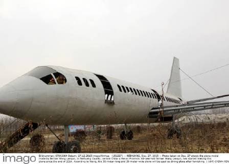 (151227) -- NEIHUANG, Dec. 27, 2015 -- Photo taken on Dec. 27 shows the plane model made by farmer Wang Lanqun, in Neihuang County, central China s Henan Province. 61-year-old farmer Wang Lanqun, has started making this plane since the end of 2014. According to Wang, the 35-meter-long and 38-meter-wide plane will be used as dining place after furnishing. ) (dhf) CHINA-HENAN-FARMER-PLANE MODEL (CN) LiuxXiaokun 