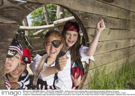 children playing on a pirate ship in adventure playground, Bavaria, Germany mit_2017_00437