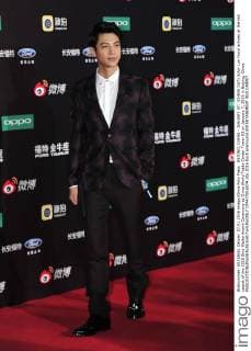 BEIJING, CHINA - JANUARY 07: (CHINA OUT) Actor Luo Yunxi arrives at the red carpet of the 2015 Sina Weibo Award Ceremony at China World Trade Center Tower III on January 7, 2016 in Beijing, China.  CFP477916074
