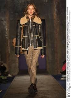 Image licensed to i-Images Picture Agency. 09 01 2016. London, United Kingdom. Female model on the catwalk at the Coach show on day two of London Men s Fashion Week for autumn winter 2016.  xStephenxLockx xi-Imagesx IIM-11695-0016