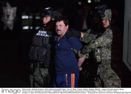 Jan. 8, 2016 - Mexico, Distrito Federal, MEXICO - Joaquin El Chapo Guzman faces the press as he is escorted to a helicopter in handcuffs by Mexican soldiers and marines at a federal hangar in Mexico City, Mexico, Friday January. 8, 2016. ANTONIO NAVA PI Mexico MEXICO - ZUMAp124