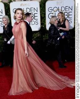 Actress Amber Heard attends the 73rd annual Golden Globe Awards at the Beverly Hilton Hotel in Beverly Hills, California on January 10, 2016.  LAP20160110741 JIMxRUYMEN