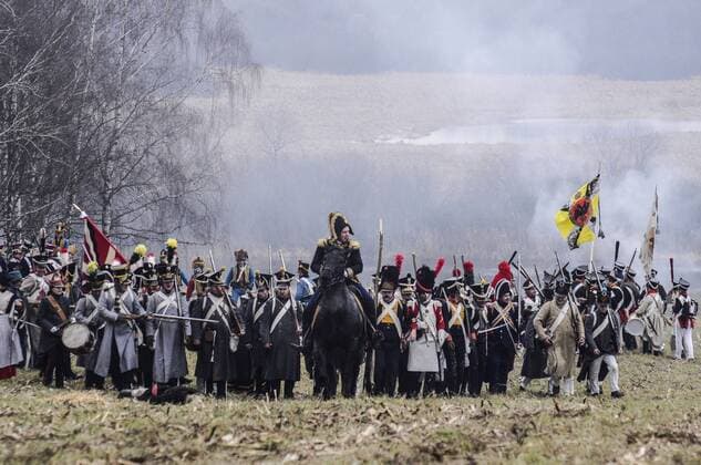 Nov. 24, 2012 - Studenka, Belarus - BELARUS, Studenka.Military history buffs and re-enactors, dressed in the uniform of Russian and French armies in 1812, participate in the formulation of the battle to commemorate the 200th anniversary of Napoleon s army retreat from Russia and the crossing of the Berezina River near the village of Studenka, about 85 kilometers from Minsk, 24 November 2012 year. Around 50,000 people, soldiers from both sides and civilians, were killed during the crossing. In total, nearly half a million soldiers, from France, as well as all of the vassal states of Europe, invaded Russia in June 1812. By the end of December 2012 by the Grand Army of Napoleon left about 10,000 people. - ZUMAb11