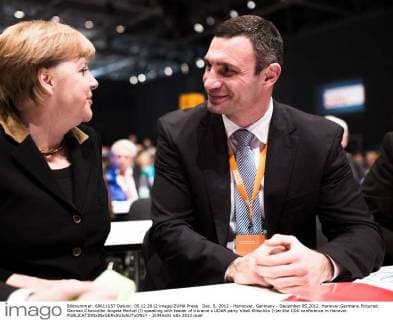 Dec. 5, 2012 - Hannover, Germany - December 05,2012. Hanover,Germany.Pictured: German Chancellor Angela Merkel (l) speaking with leader of Ukraine s UDAR party Vitali Klitschko (r)at the CDU conference in Hanover. - ZUMAx01