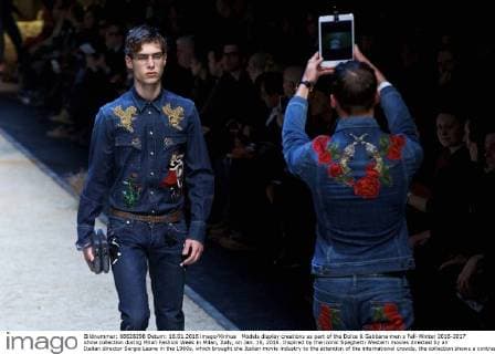 Models display creations as part of the Dolce & Gabbana men s Fall-Winter 2016-2017 show collection during Milan Fashion Week in Milan, Italy, on Jan. 16, 2016. Inspired by the iconic Spaghetti Western movies directed by an Italian director Sergio Leone in the 1960s, which brought the Italian movie industry to the attention of the international crowds, the collection shows a contrast between the past (via the embroideries and embellishments of the Wild West) and the present (the shapes, cut, and fit). ) ITALY-MILAN-D&G-FASHION WEEK JinxYu 