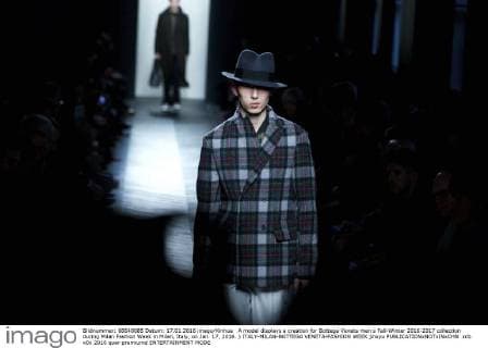 A model displays a creation for Bottega Veneta men s Fall-Winter 2016-2017 collection during Milan Fashion Week in Milan, Italy, on Jan. 17, 2016. ) ITALY-MILAN-BOTTEGA VENETA-FASHION WEEK jinxyu 