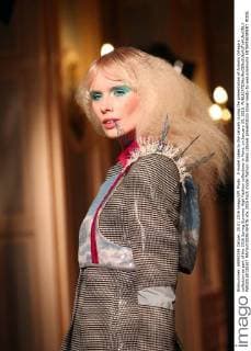 A model takes to the catwalk during the presentation of Antonio Ortega s collection as part of the 2016 Spring Summer High Fashion collections in Paris, on January 25, 2016.  PAR20160125107 MAYAxVIDON-WHITE
