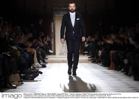 Fashion designer Julien Fournie salutes the audience at the end of the presentation of his collection as part of the 2016 Spring Summer High Fashion collections in Paris, on January 26, 2016.  PAR20160126101 MAYAxVIDON-WHITE