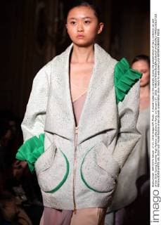 A model takes to the catwalk during the presentation of Ilja s collection as part of the 2016 Spring Summer High Fashion collections in Paris, on January 27, 2016.  PAR20160127102 MAYAxVIDON-WHITE