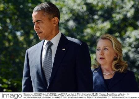 July 4, 2012 - Washington, DC, USA - President Barack Obama walks down the Colonnade with Secretary of State Hillary Clinton, right, to deliver remarks on the killing of US ambassador to Libya, Christopher Stevens, and three embassy staff, Wednesday, September 12, 2012, in the Rose Garden of the White House in Washington, D.C. Gunmen attacked the US consulate in Benghazi, killing Stevens and three others, late September 11, 2012, while another assault took place on the US embassy in Cairo. - ZUMAm67_