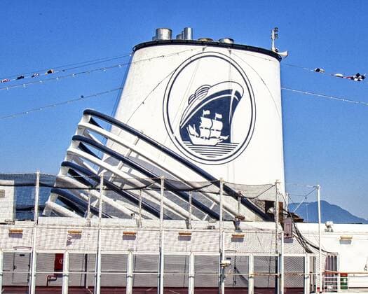 July 8, 2012 - Vancouver, British Columbia, CANADA - The funnel on the superstructure of the cruise ship Zaandam has the logo of its corporate parent, Holland America Lines. Photographed in Vancouver, British Columbia, where cruise ships and their passengers are an important contributor to the local economy. - ZUMAd84_