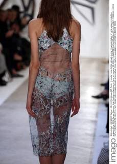 A model takes to the catwalk during the presentation of Loris Azzaro s collection as part of the 2016 Spring Summer High Fashion collections in Paris on January 28, 2016.  PAR20160128112 MAYAxVIDON-WHITE