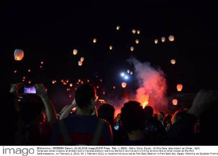 Feb. 1, 2016 - Cairo, Cairo, Egypt - Al Ahly fans, also known as Ultras , light flares and shout slogans at al-Ahly club s training stadium marking the fourt anniversary of killing al-Ahly fans in what known as the Port Said massacre , on February 1, 2016. On 1 February 2012, a massive riot occurred at Port Said Stadium in Port Said city, Egypt, following an Egyptian Premier League football match between El Masry and El Ahly clubs. At least 74 people were killed and more than 500 were injured after thousands of El Masry spectators stormed the stadium stands and the pitch Cairo Egypt - ZUMAap3_