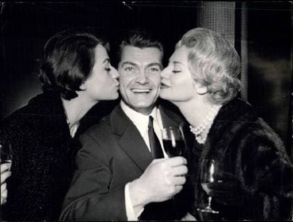 1969 - Two on the See-Saw reaches its 100th performance A cocktail party was given yesterday evening by Mme. Gilberte Refoule, theatre director, and Lars Schmidt for the 100th performance, starring Jean Marias and Annie Girardot. OPS: Jean Marais being congratulated by his partner Annie Girardot and by the young French actress Francoise Christophe. Keystone - ZUMAk09_