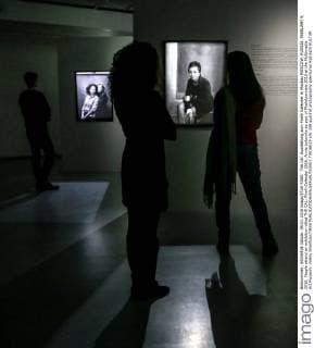 The Cal: Ausstellung zum Pirelli Kalender in Moskau MOSCOW, RUSSIA. FEBRUARY 9, 2016. People attend an exhibition titled THE CAL: Pirelli Calendar 2016. Annie Leibovitz as part of Photobiennale 2016 at the Multimedia Art Museum. Valery Sharifulin TASS  TS016E19