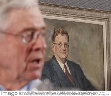 May 22, 2012 - Wichita, KS, USA - Charles Koch, 76, speaks during an interview, May 22, 2012, in his office at Koch Industries in Wichita, Kansas, where Koch Industries manages 60,000 employees in 60 countries. A portrait of is late father and company founder Fred Koch, hangs over his shoulder. - ZUMAm67_