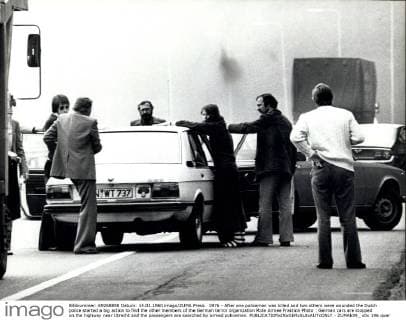 1976 - After one policeman was killed and two others were wounded the Dutch police started a big action to find the other members of the German terror organization Rote Armee Fraktion Photo : German cars are stopped on the highway near Utrecht and the passengers are searched by armed policemen. - ZUMAk09_